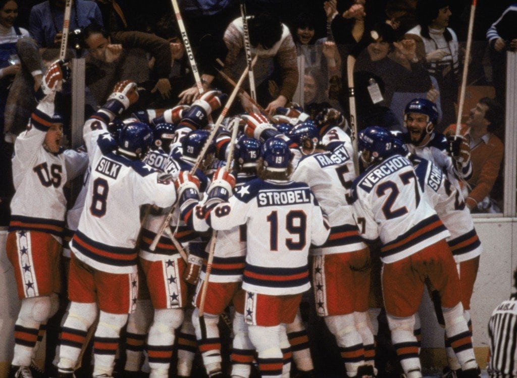 LAKE PLACID, NY - FEB 22: Team USA celebrates their 4-3 victory over the Soviet Union in the semi-final Men's Ice Hockey event at the Winter Olympic Games in Lake Placid, New York on February 22, 1980. The game was dubbed "the Miracle on Ice". The USA went on to win the gold medal by defeating Finland 4-2 in the gold medal game. (Photo by Steve Powell /Getty Images)