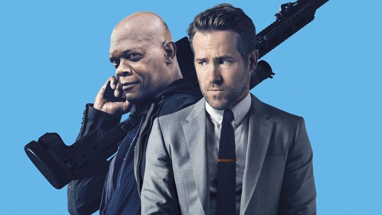En bild på Ryan Reynolds och Samuel L. Jackson i sinna roller i filmen The Hitman's Bodyguard.