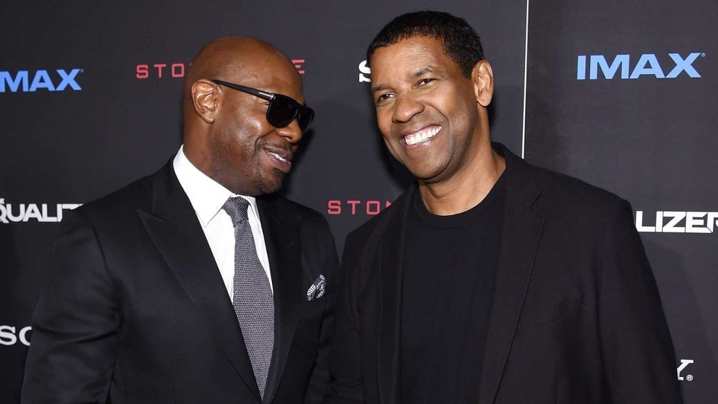 På bilden ser vi regissören Antoine Fuqua och skådespelaren Denzel Washington tillsammans