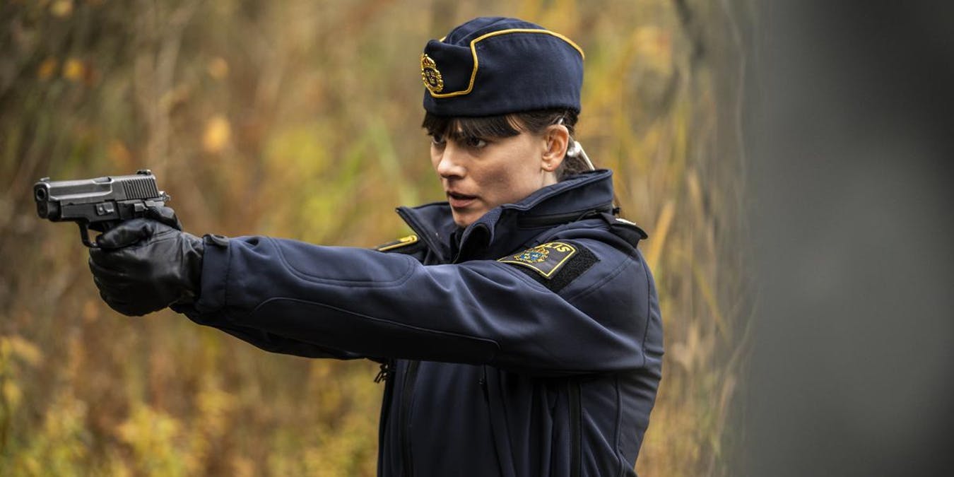 Polisen Huss riktar vapen